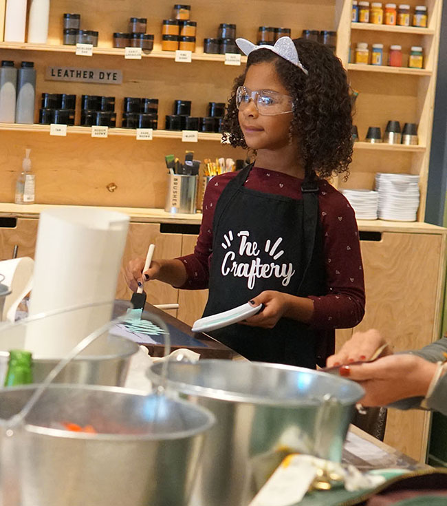 Little Girl Crafting at the craftery